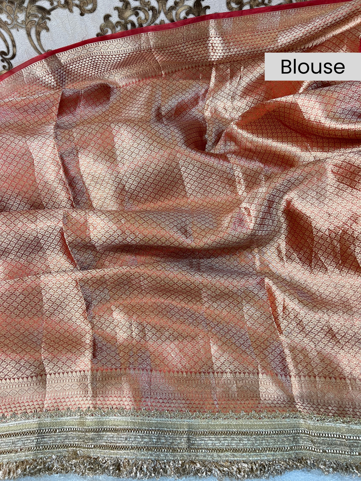 “Red Morni traditional Indian saree with intricate design”