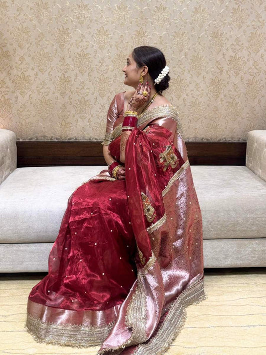 “Red Shahi Gaj saree with rich embroidery and traditional motifs for festive occasions”