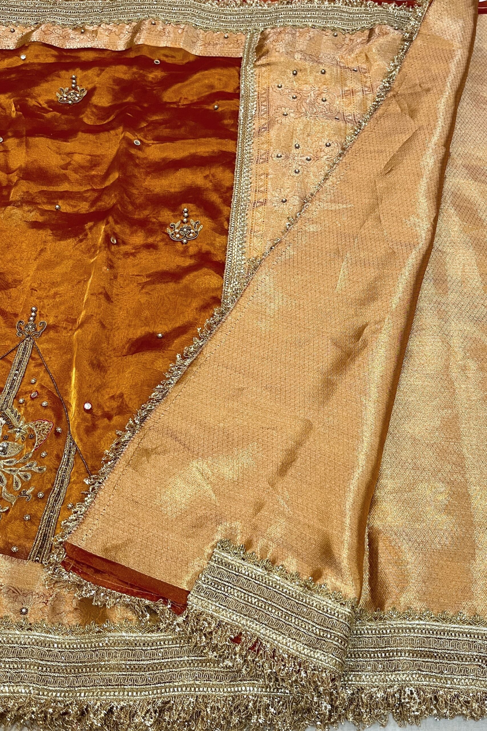 Gold Hand Embroidered Kanjivaram Tissue Silk Saree featuring intricate peacock motifs and unstitched brocade blouse, ideal for weddings and rituals.