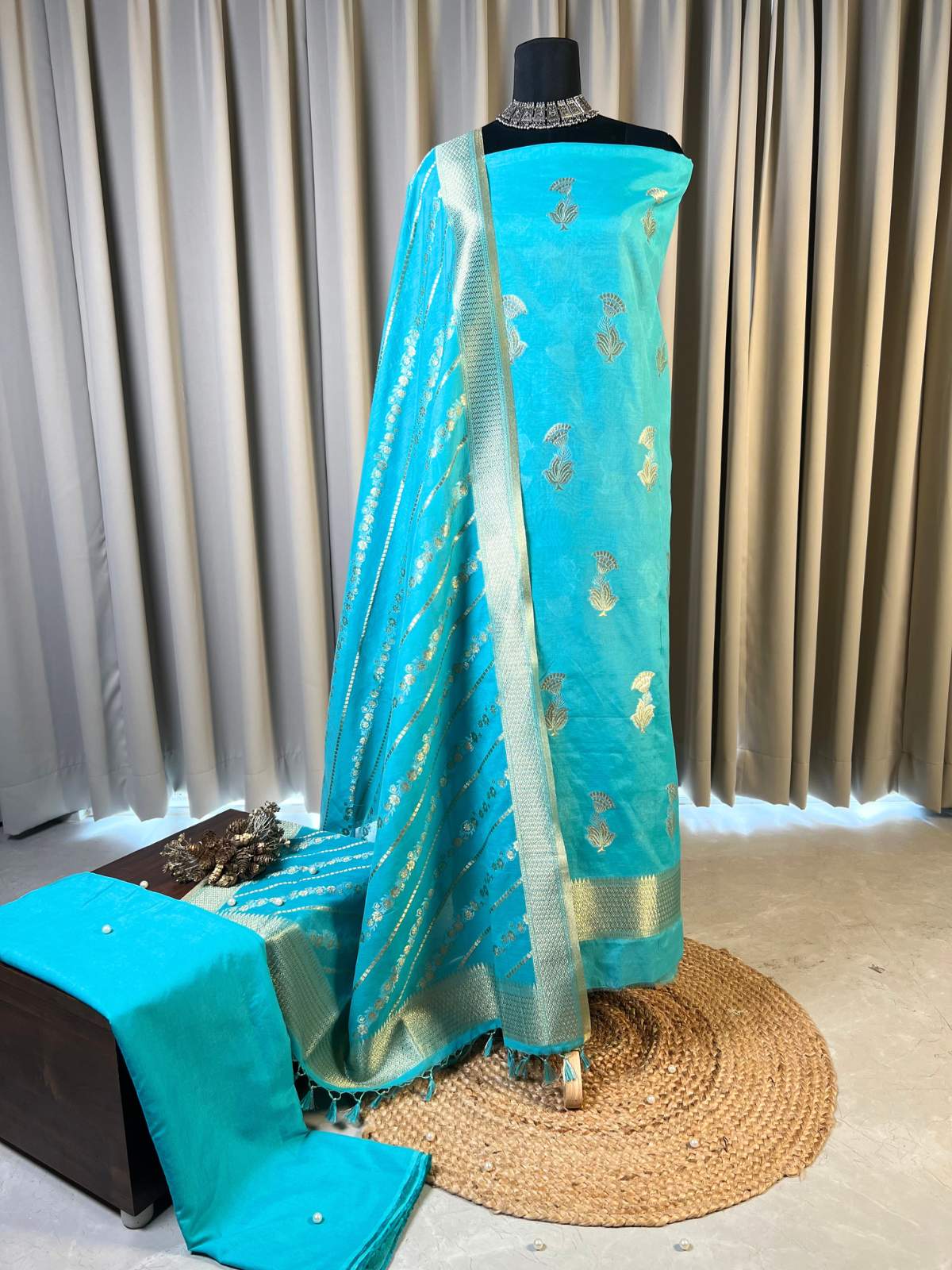 Turquoise cotton silk suit with zari buti and woven border full view