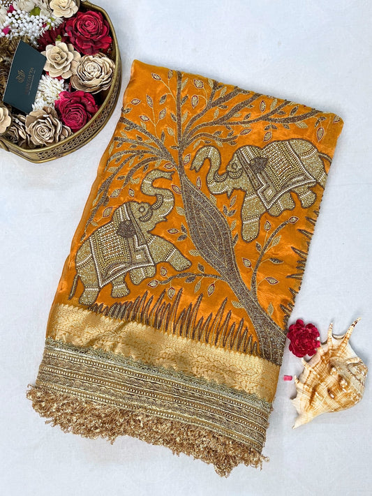 Yellow Tissue Silk Saree with twin elephant hand embroidery