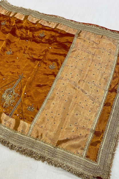 Gold Hand Embroidered Kanjivaram Tissue Silk Saree featuring intricate peacock motifs and unstitched brocade blouse, ideal for weddings and rituals.
