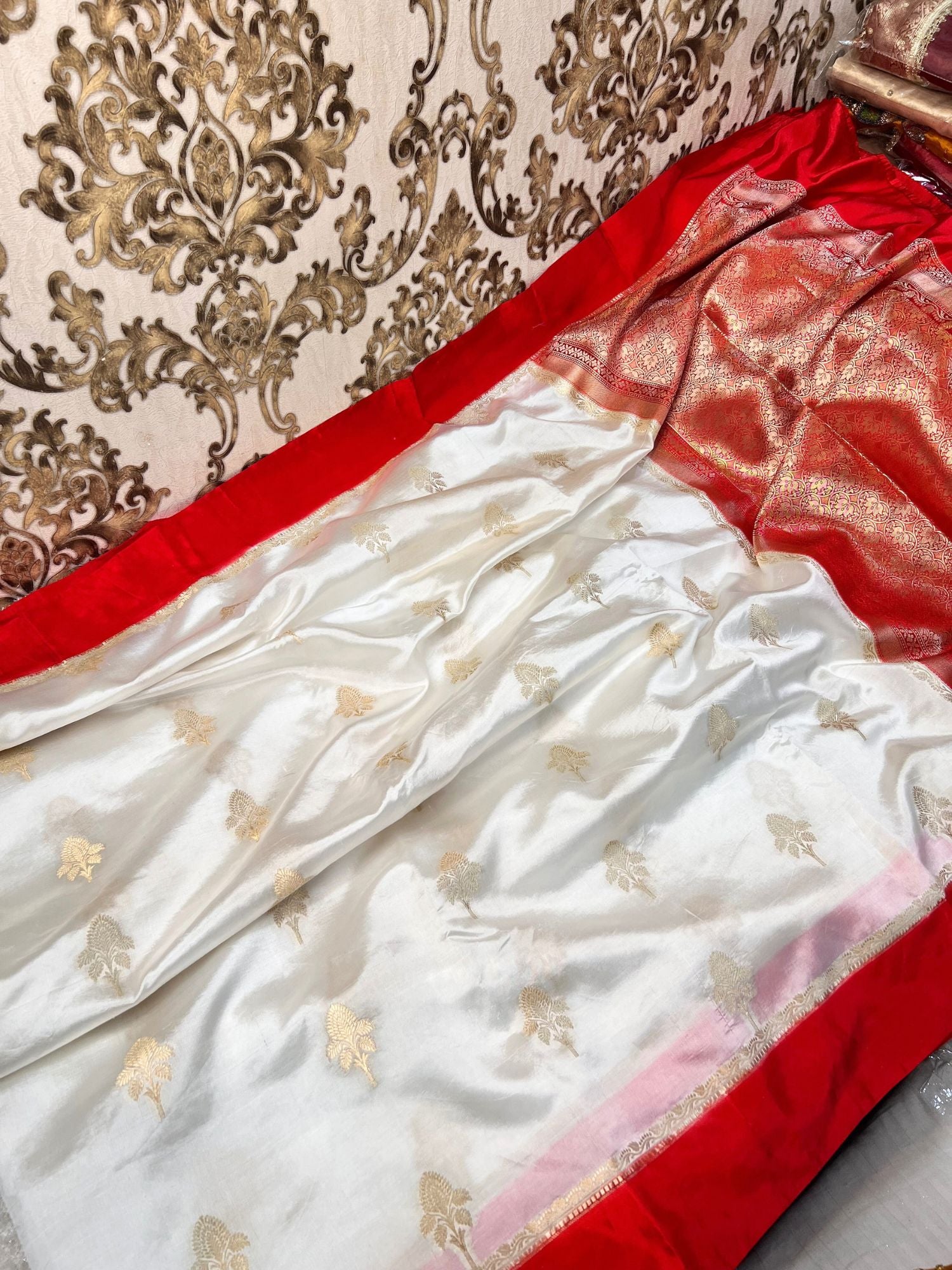 “White Devyani saree with classic embroidery and motifs”