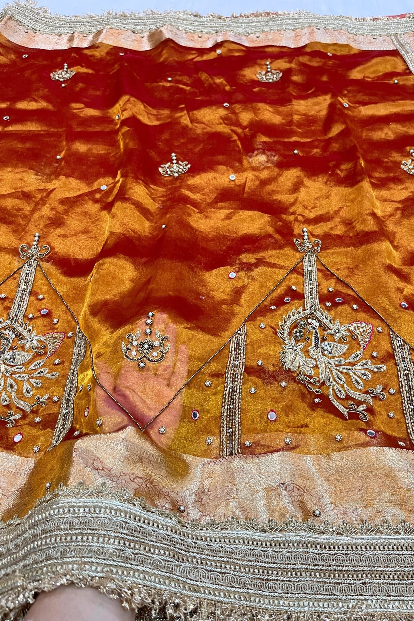 Gold Hand Embroidered Kanjivaram Tissue Silk Saree featuring intricate peacock motifs and unstitched brocade blouse, ideal for weddings and rituals.