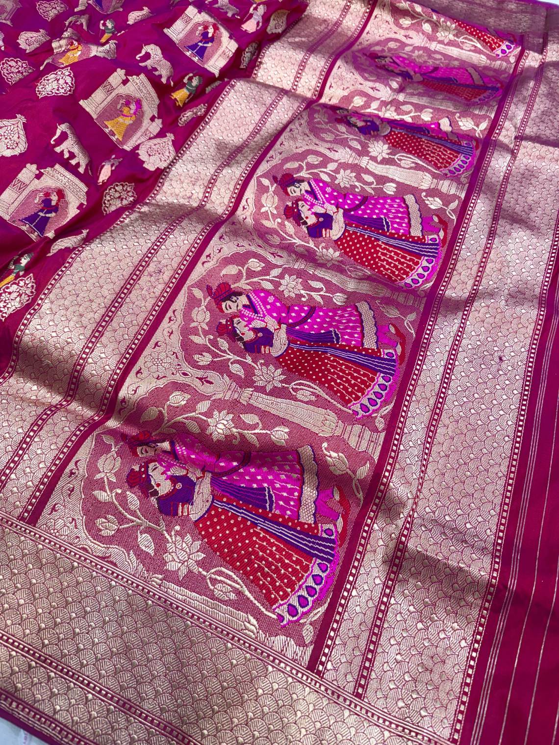 Deep Magenta Katan Silk Saree with royal scenes kings closeup view 01
