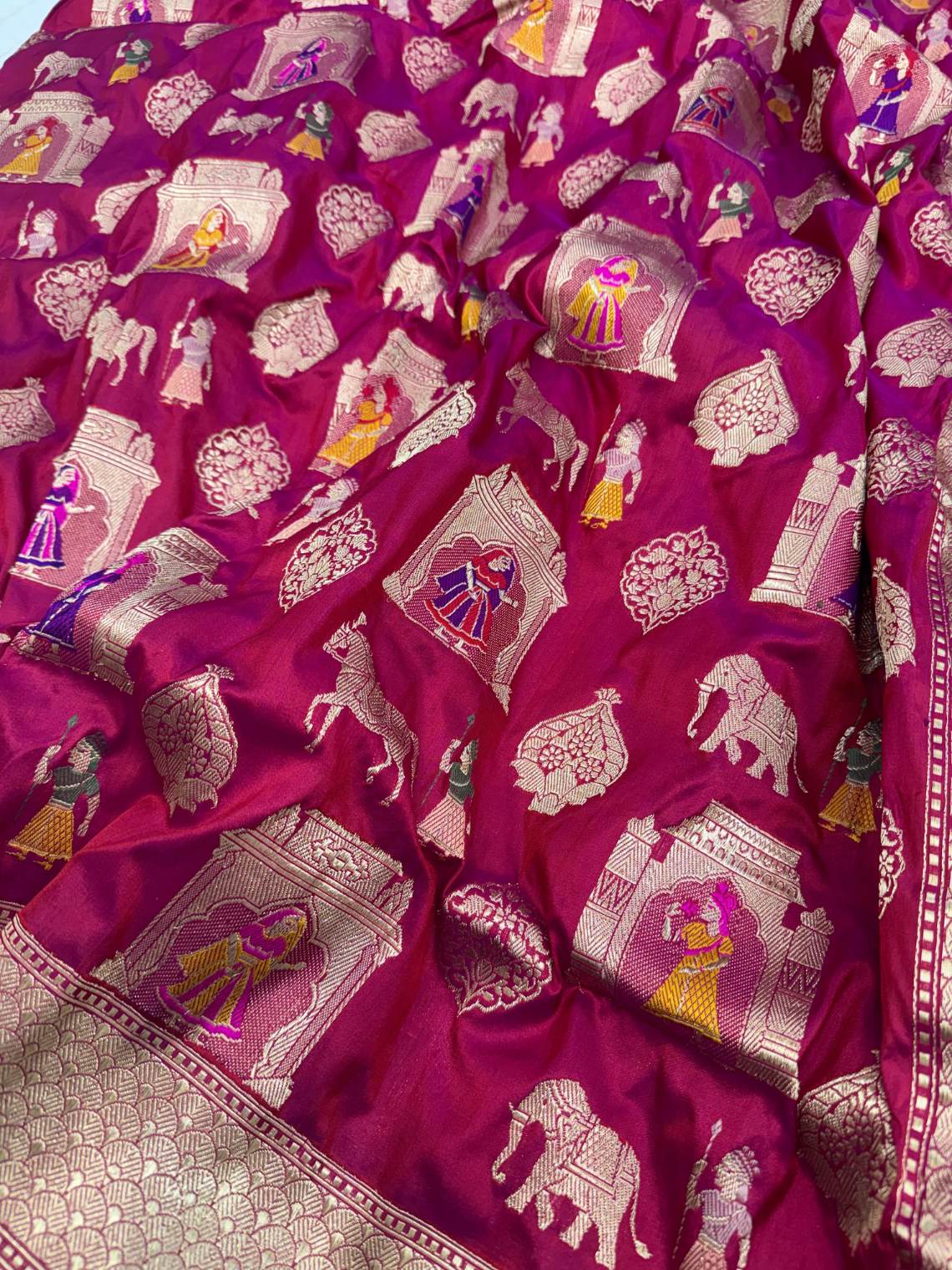 Deep Magenta Katan Silk Saree with royal scenes kings closeup view 02
