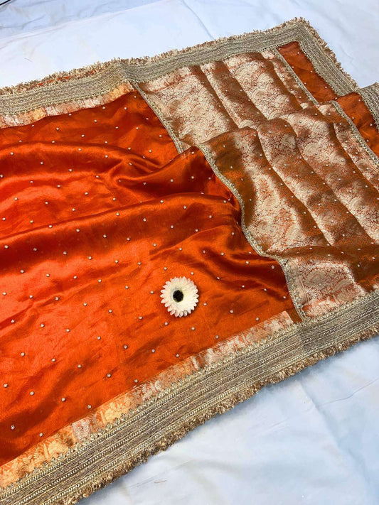 Manatavya Banaras orange tissue silk saree with subtle sheen, lightweight drape and elegant traditional craftsmanship
