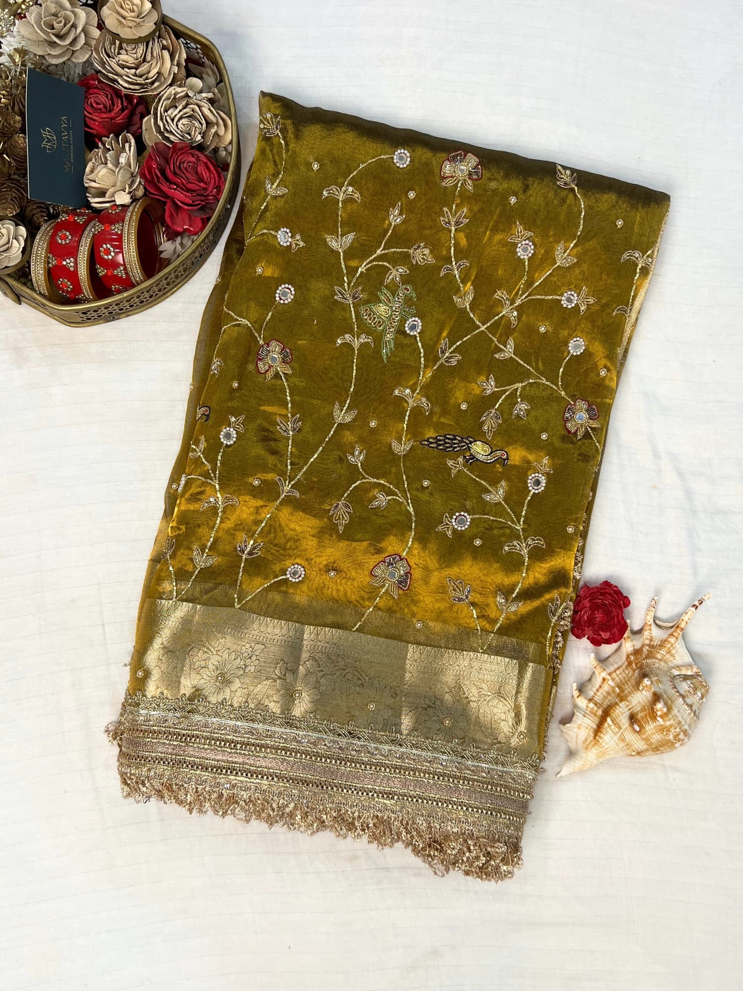 Gulmohar Mehendi green tissue silk saree with hand embroidery, birds and floral work, zari border