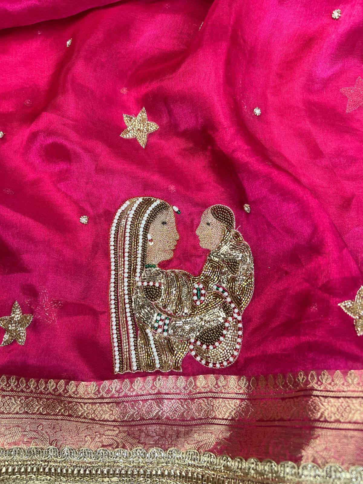 Manatavya Banaras hot pink Baby Shower saree with lightweight drape, vibrant color and elegant festive design