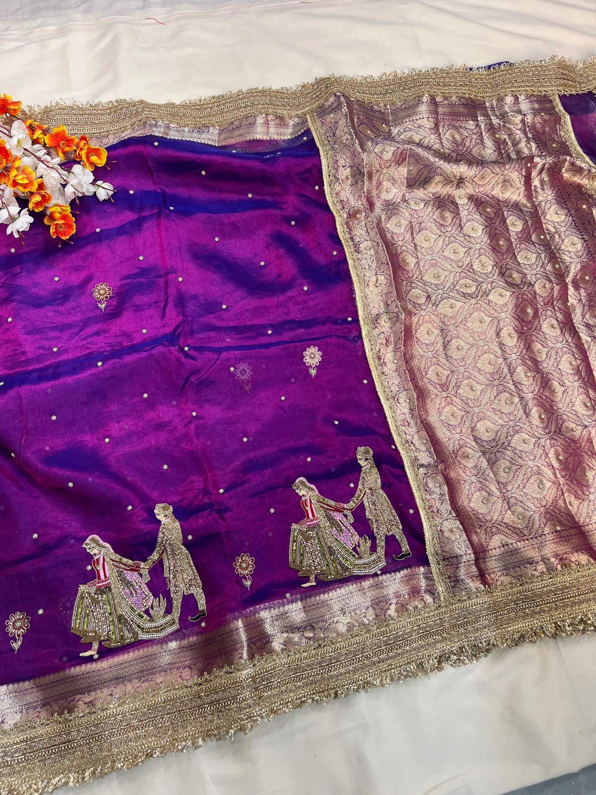 Manatavya Banaras purple Banarasi tissue silk wedding saree with Saat Phere embroidery