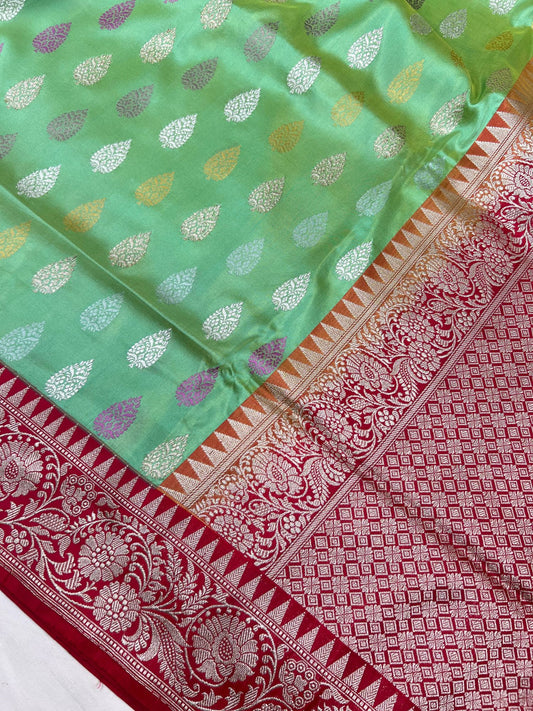  Mint Green Katan Silk Saree With red zari-woven border closeup view