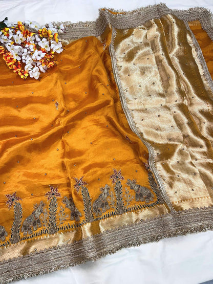 Orange Gajgamini Banarasi silk saree blouse inspired by royal elephant motifs