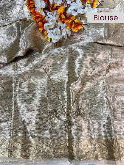Manatavya Banaras ivory champagne Brocade tissue silk saree with intricate zari patterns, lightweight drape and elegant festive design