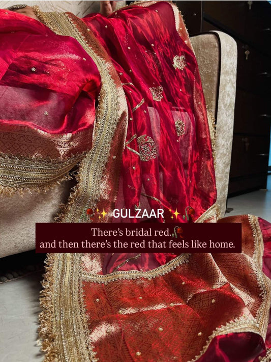 “Red Gulzaar festive saree with intricate traditional embroidery”