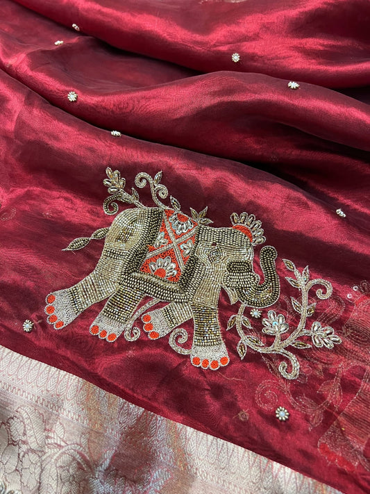 “Red Shahi Gaj saree with rich embroidery and traditional motifs for festive occasions”
