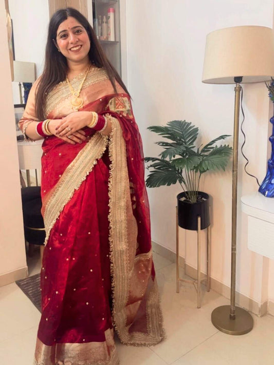 Hand-embroidered maroon tissue silk saree with golden elephant motifs – Banarasi traditional wear