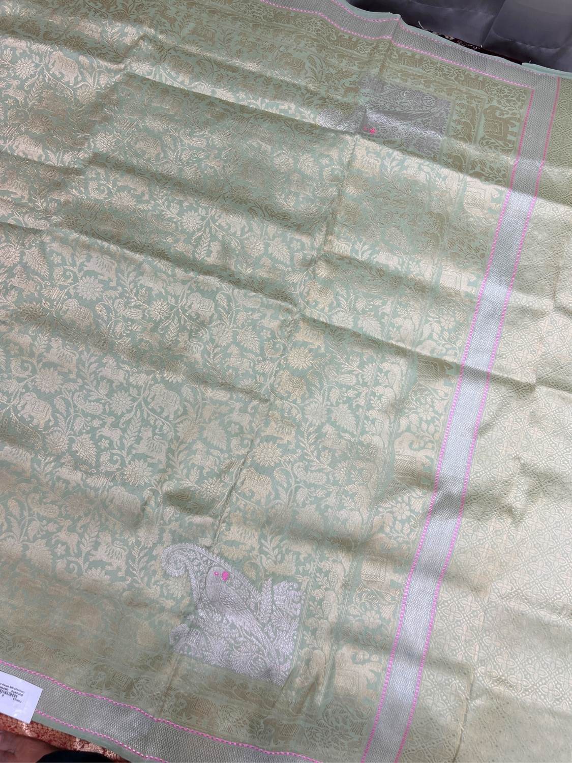 Pista Green Katan Silk Saree with floral vines and animal full view