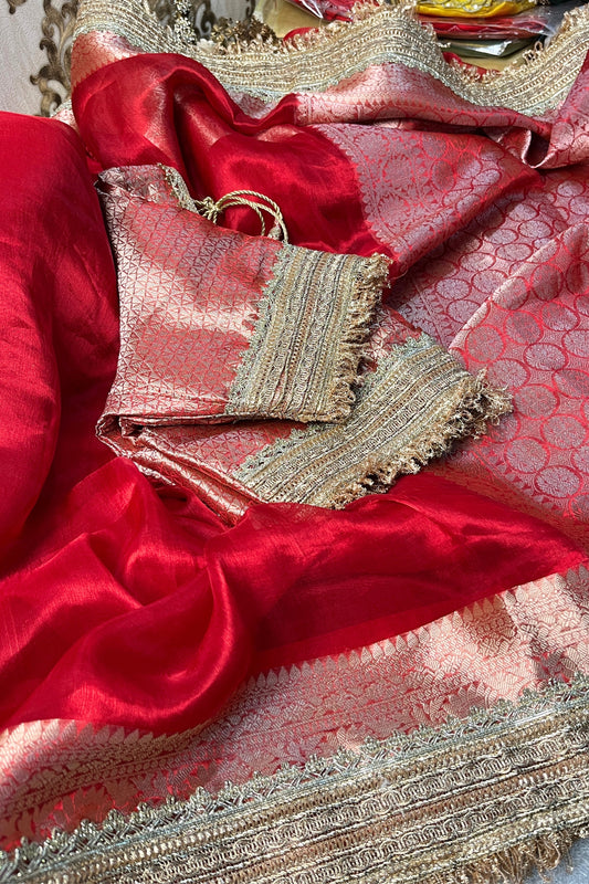 Royal Red Pure Banarasi Tissue Silk Saree with a soft sheen and unstitched brocade blouse, ideal for weddings and festive occasions.