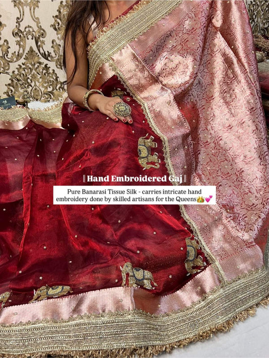 Maroon Gaj Banarasi silk saree with traditional elephant motif