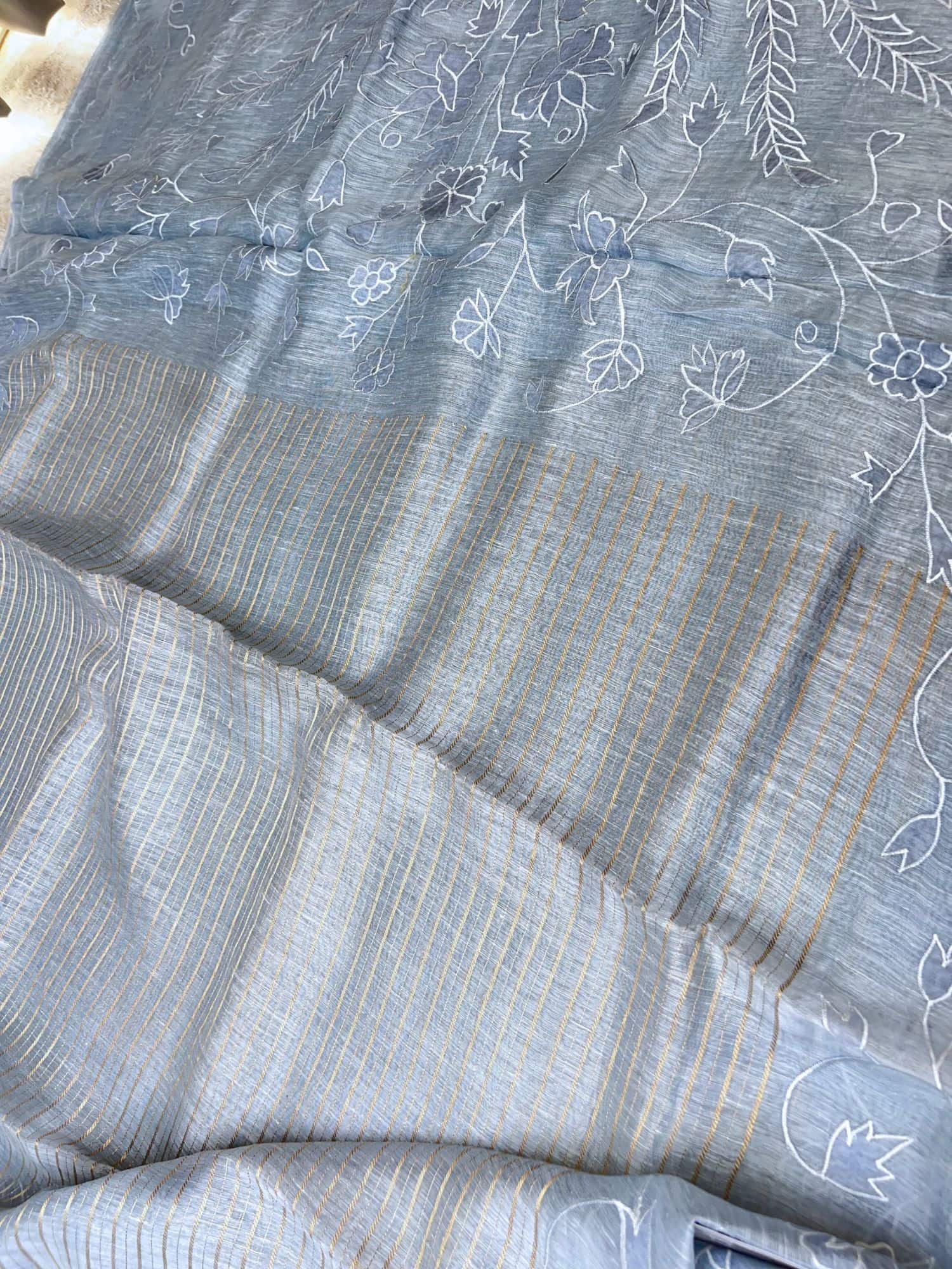 Manatavya Banaras silver blue linen tissue silk saree with lightweight drape, subtle sheen and elegant handwoven texture