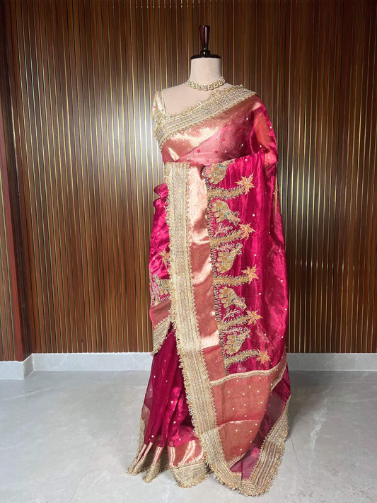 Hot pink Tissue Silk Saree Gajgamini with graceful traditional patterns dummy view