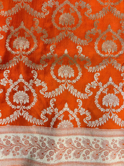 Orange Katan Silk saree with  floral jaal closeup view