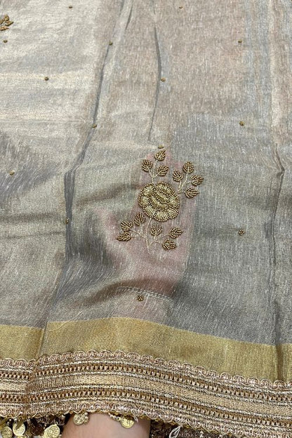 Hand-Embroidered Grey Linen Tissue Silk Saree with intricate detailing, lightweight texture, and elegant shimmer – perfect for festive and formal wear