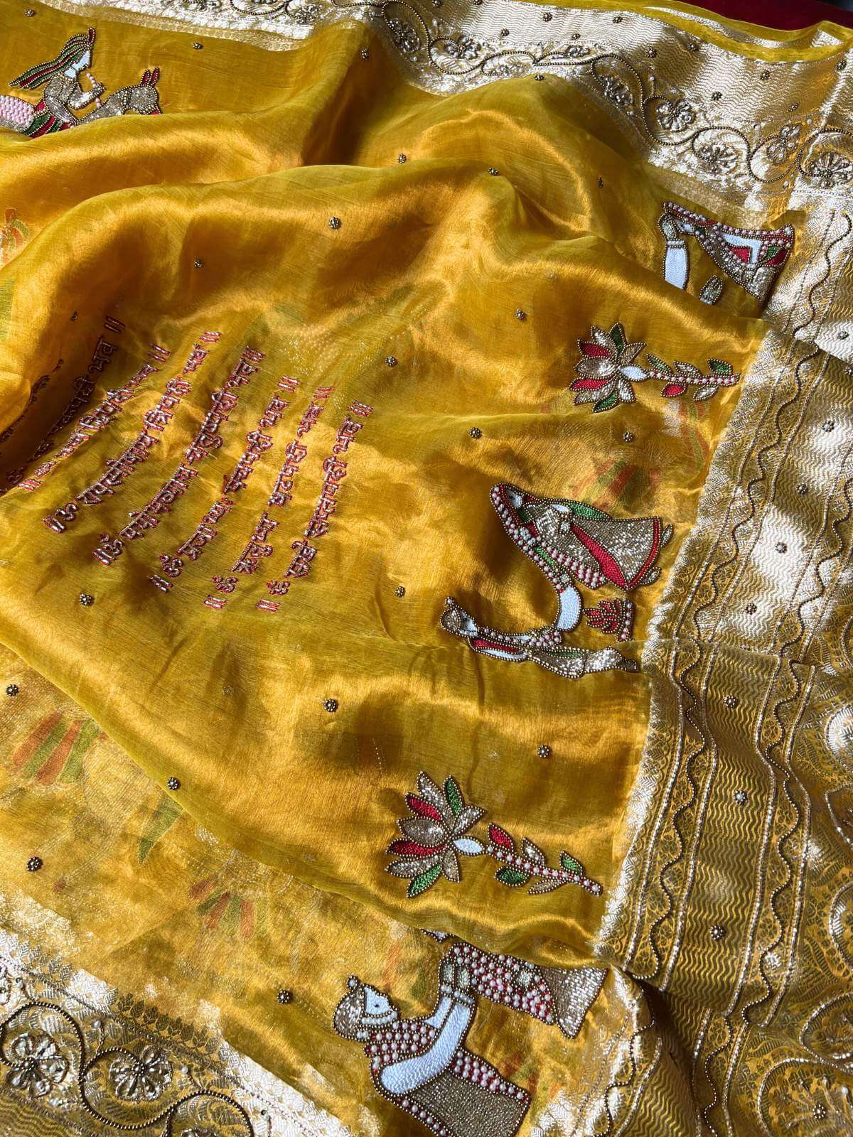 Mustard Yellow Tissue Silk Saree Vivah with Hand-embroidered Saat Vachan Closeup view 01