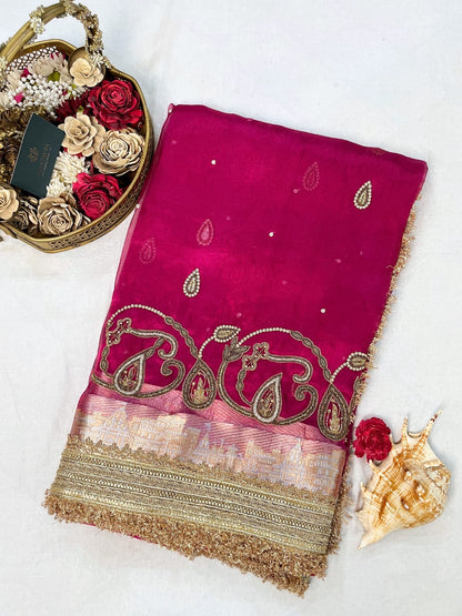 Hand-embroidered pink tissue silk saree featuring zari paisley motifs and a rich golden border by Mantavya Banaras