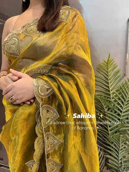 Hand-Embroidered Green Sahiba Tissue Silk Saree from Mantavya Banaras featuring intricate handcrafted motifs, perfect for weddings and festive occasions.