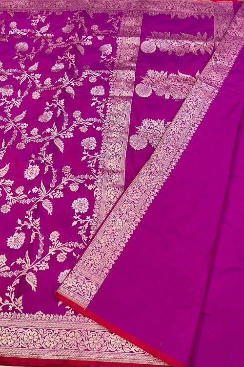 Handwoven Katan Silk Saree with intricate floral zari work and contrast selvedge border, crafted in Banaras