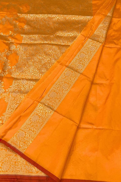 Handwoven Orange Katan Silk Saree with Floral Motifs and Contrast Border