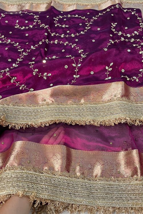 Hand Embroidered Wine Jaal Tissue Silk Saree featuring mirror work embroidery and scattered buti design, paired with unstitched wine blouse – elegant ethnic wear for weddings and festive occasions.