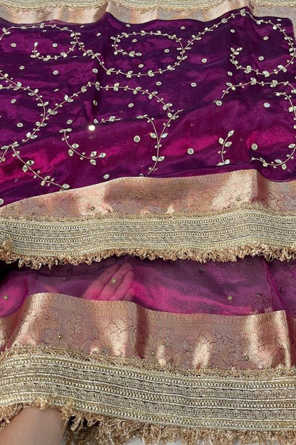 Hand Embroidered Wine Jaal Tissue Silk Saree featuring mirror work embroidery and scattered buti design, paired with unstitched wine blouse – elegant ethnic wear for weddings and festive occasions.