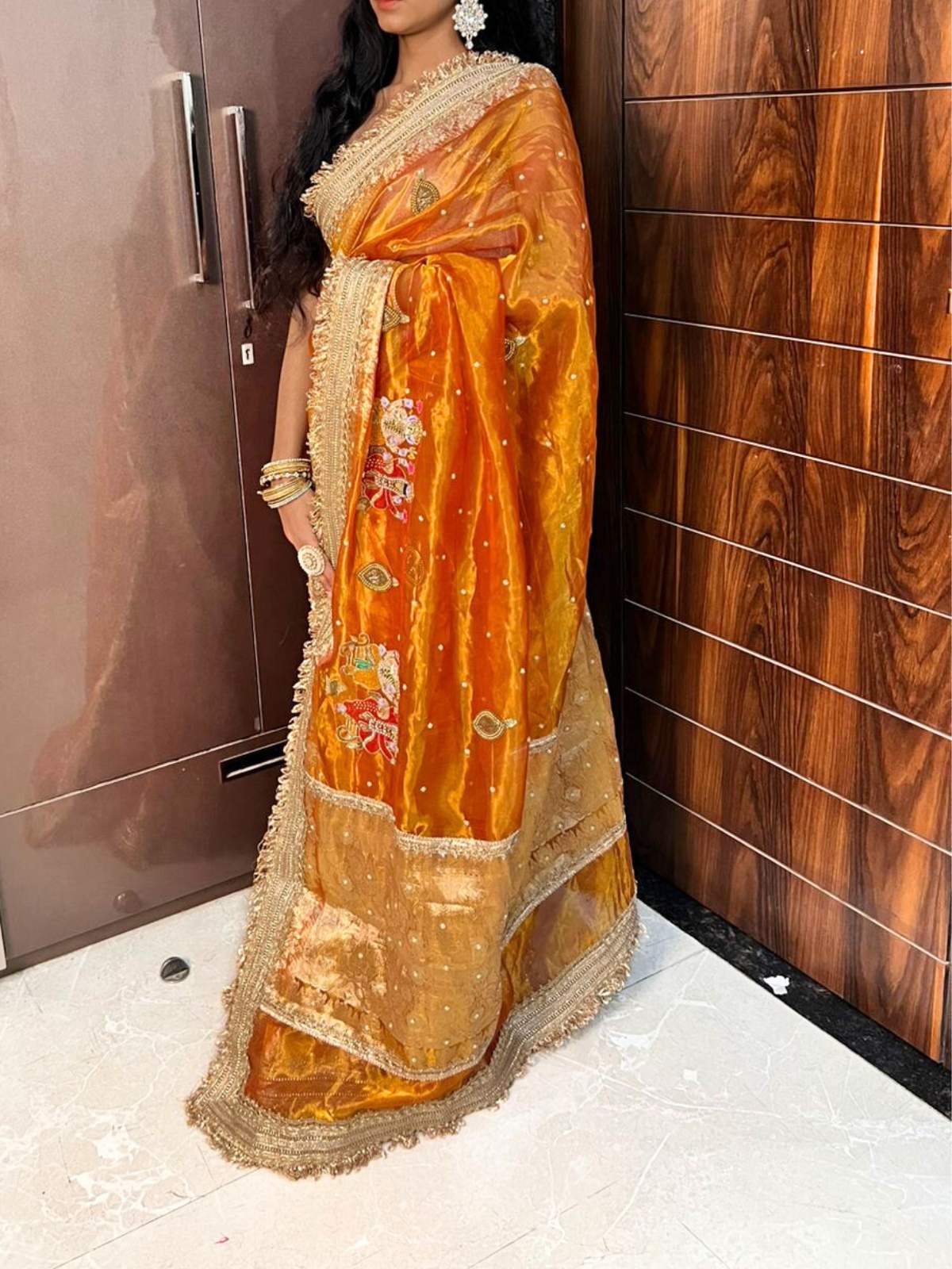 “Kanjivaram Gold Morni silk saree with elegant zari work”