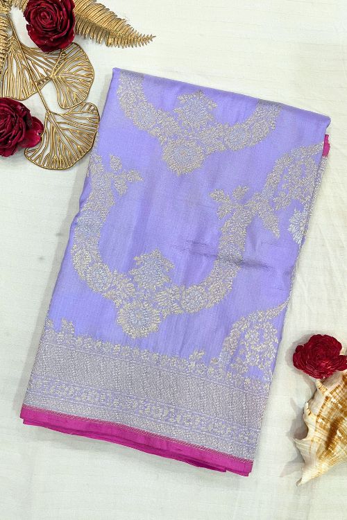 Handwoven Lilac Katan Silk Saree with gold and silver zari floral motifs, contrast selvedge border, and matching unstitched blouse