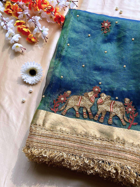Peacock teal blue Banarasi Tissue silk saree Pichwai Nandi  with sacred motifs front view