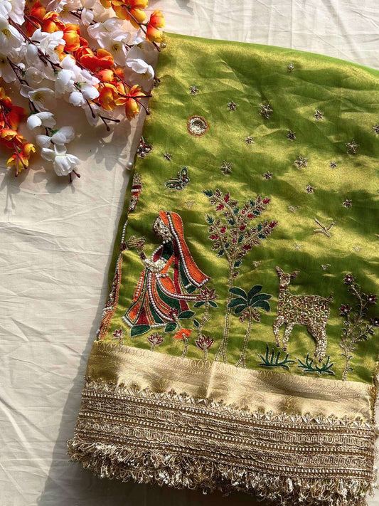 Pista green Radha Krishna Banarasi silk saree with divine traditional artwork