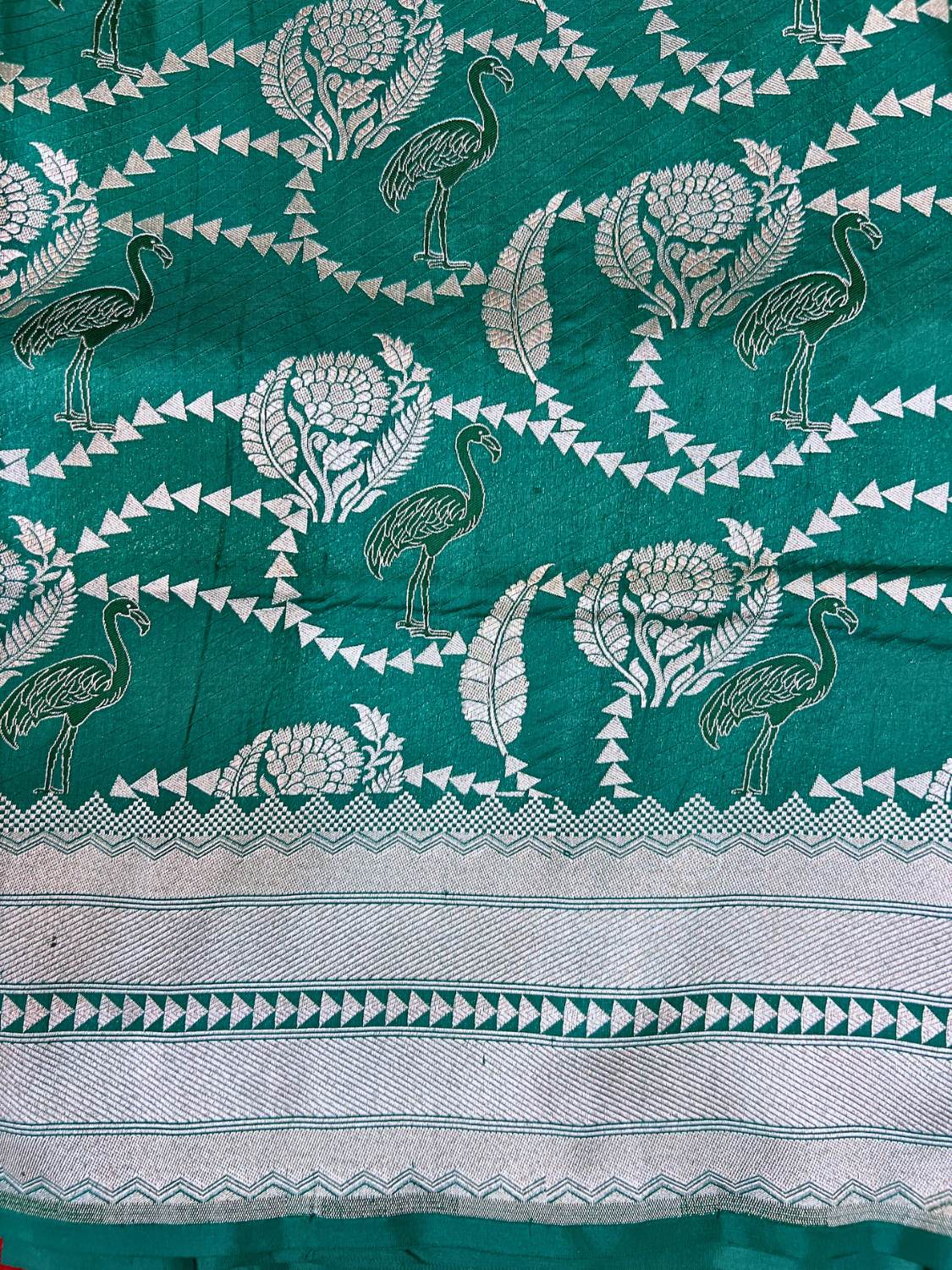 Bottle Green Katan Silk Saree with flamingo and floral closeup view