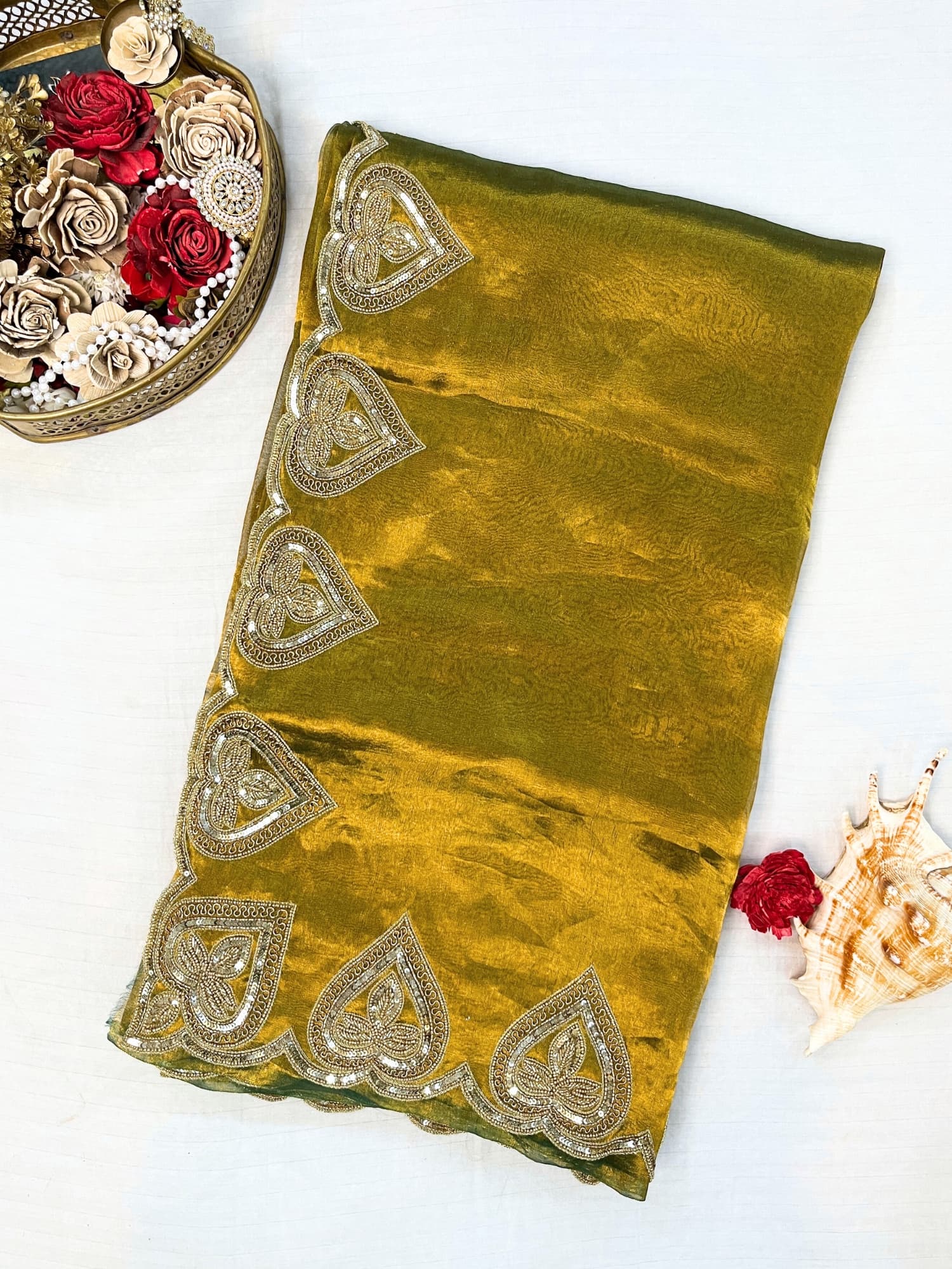 61Hand-Embroidered Green Sahiba Tissue Silk Saree from Mantavya Banaras featuring intricate handcrafted motifs, perfect for weddings and festive occasions.