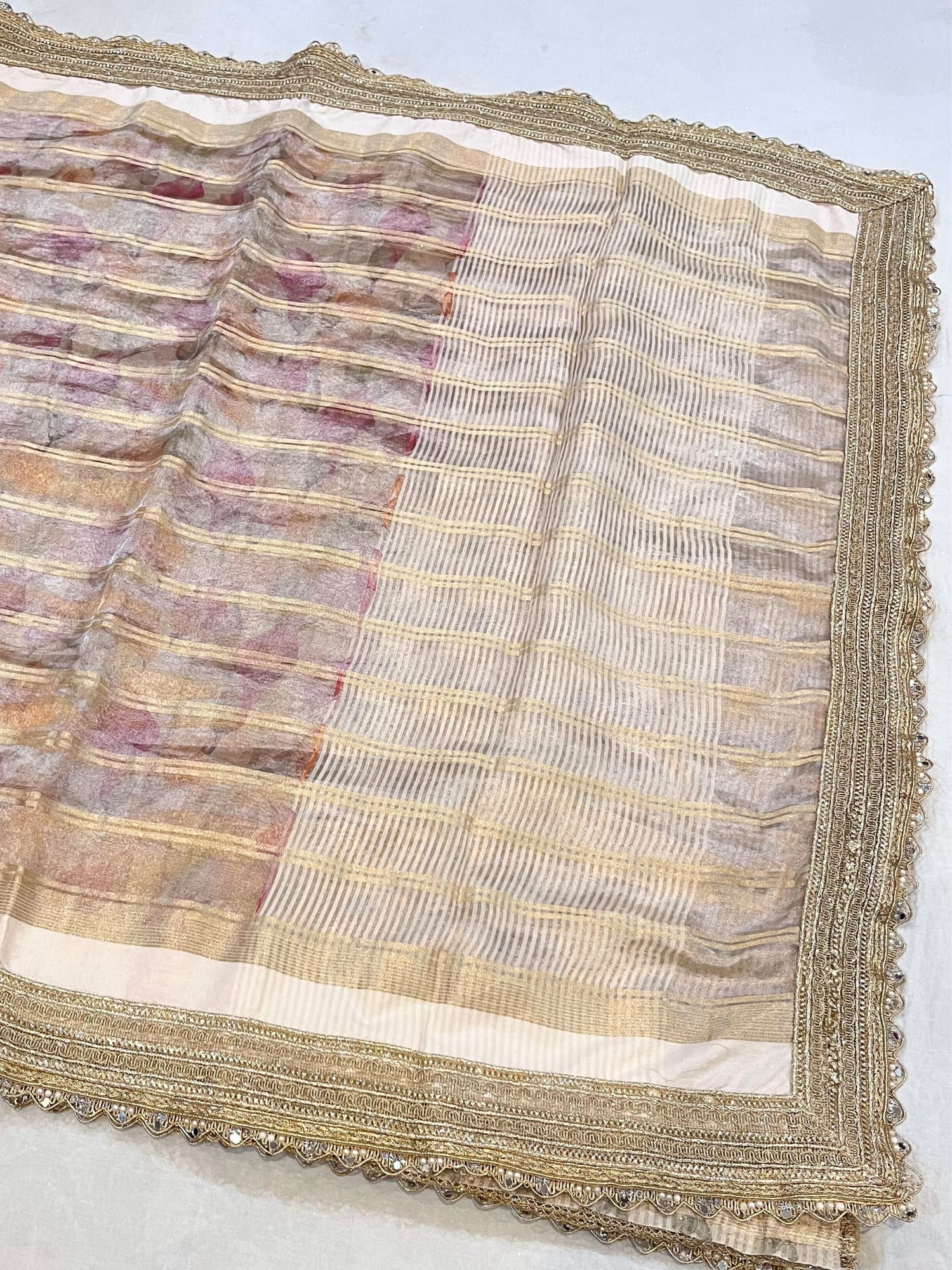 Golden Banarasi Tissue Silk Saree with gota patti border, brocade aachal, and unstitched brocade blouse – handwoven in Banaras.