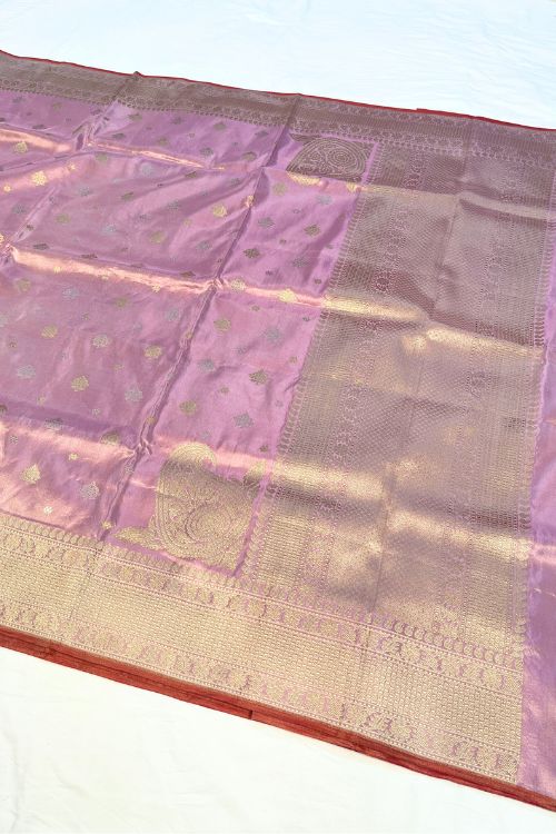 Lavender Banarasi Kora Tissue Silk Saree with zari buti and rust selvedge