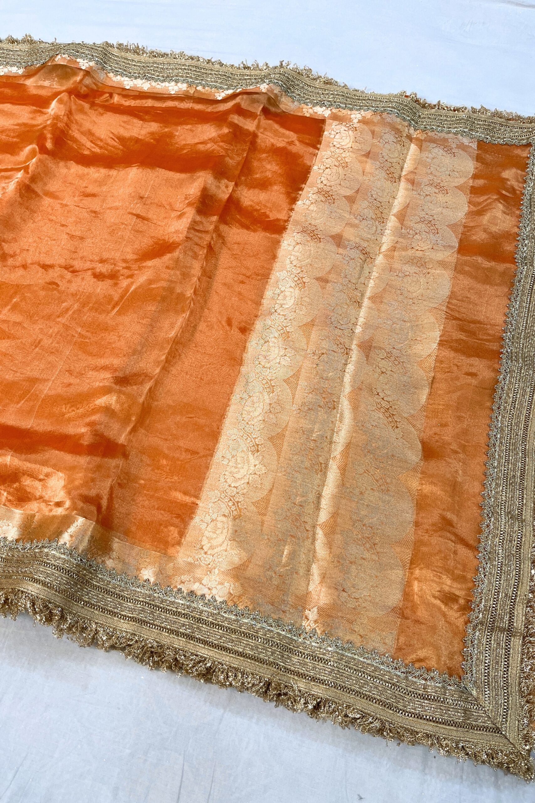 Orange Pure Banarasi Tissue Silk Saree with Gota Patti border, rich brocade Aachal, and unstitched brocade blouse piece – handcrafted in Banaras.