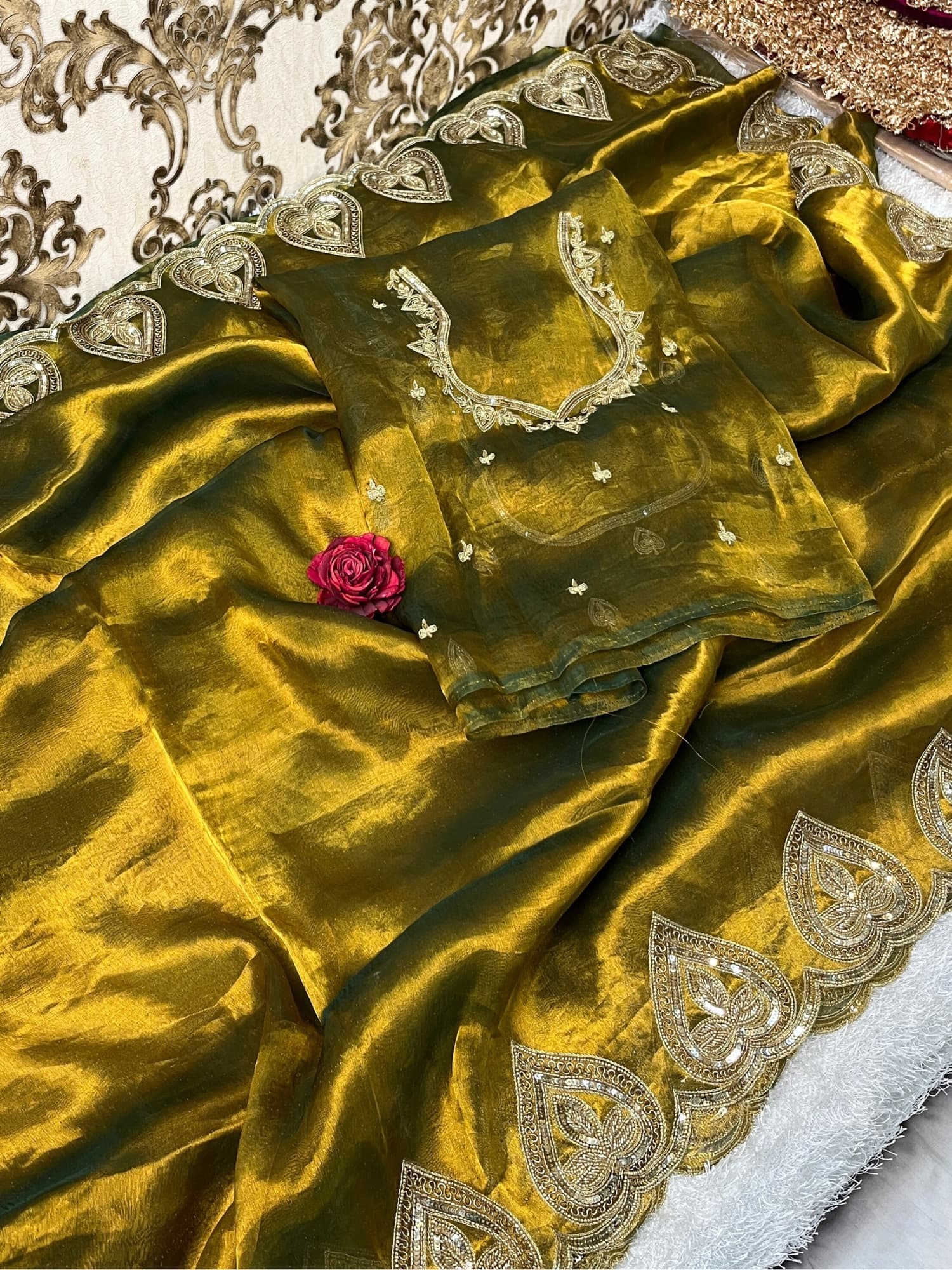 Hand-Embroidered Green Sahiba Tissue Silk Saree from Mantavya Banaras featuring intricate handcrafted motifs, perfect for weddings and festive occasions.