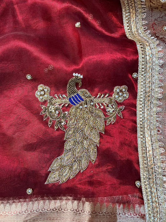 Royal red Mayur Banarasi tissue silk saree with hand-embroidered floral and bird motifs in gold zari