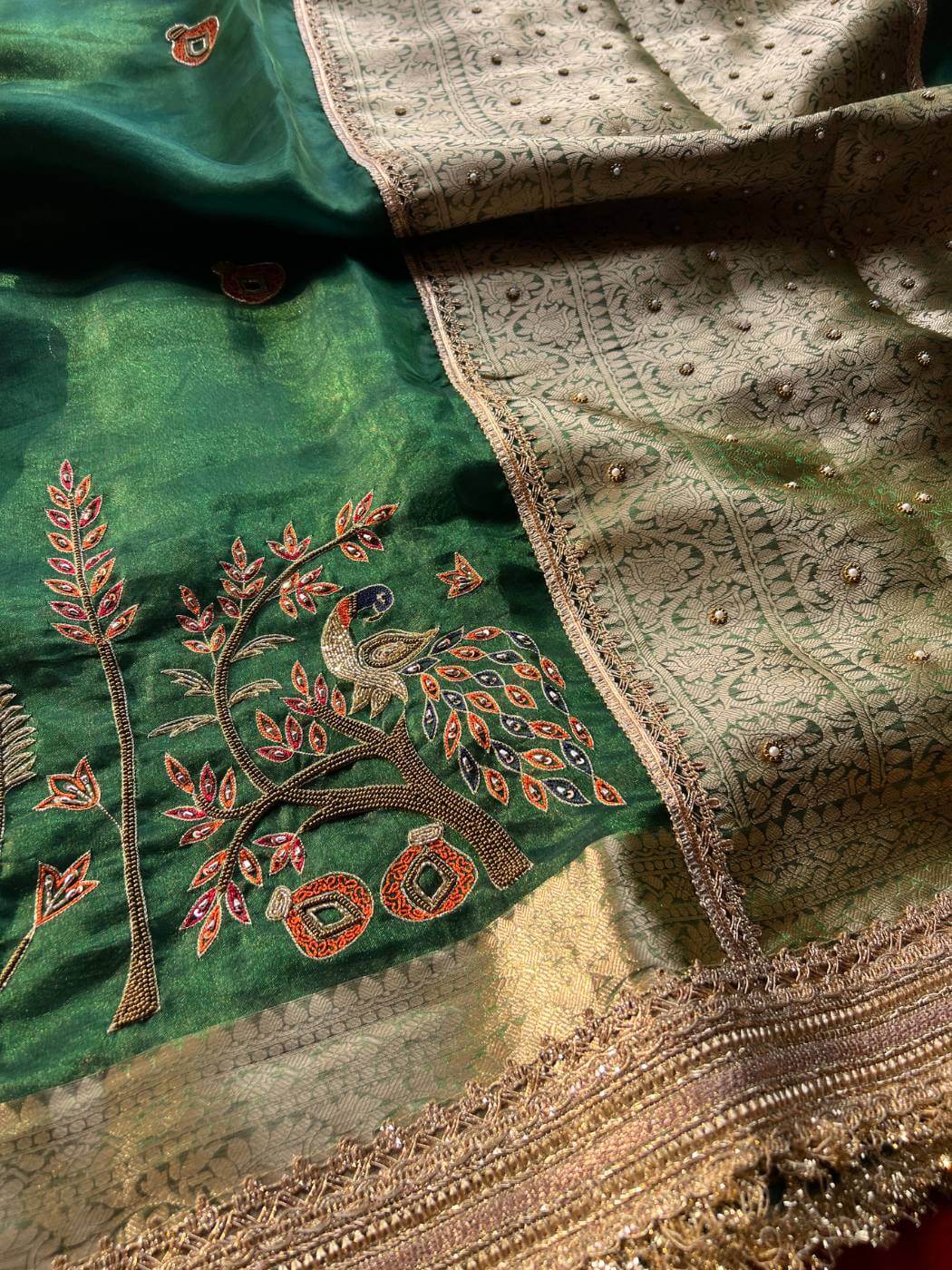 Emerald Green Tissue Silk Saree Shahi Mor with Peacock and delicate floral vines closeup view 02