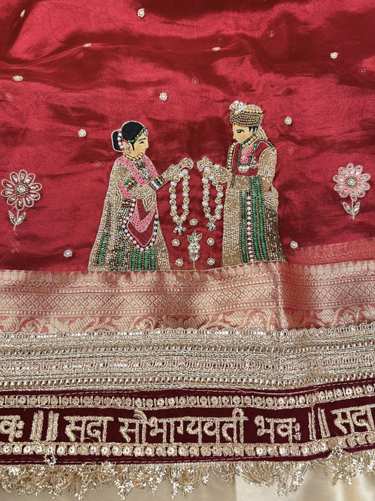 Manatavya Banaras maroon Varmala pure Banarasi tissue silk saree with intricate zari weaving, traditional floral motifs and elegant bridal design