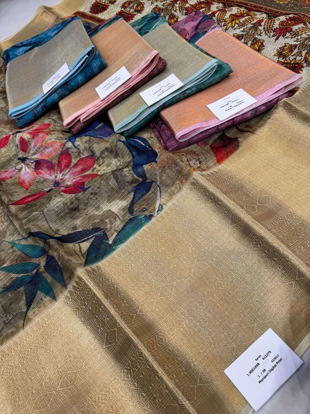 Ivory Grey Manipuri Kota silk saree with woven textures closeup view