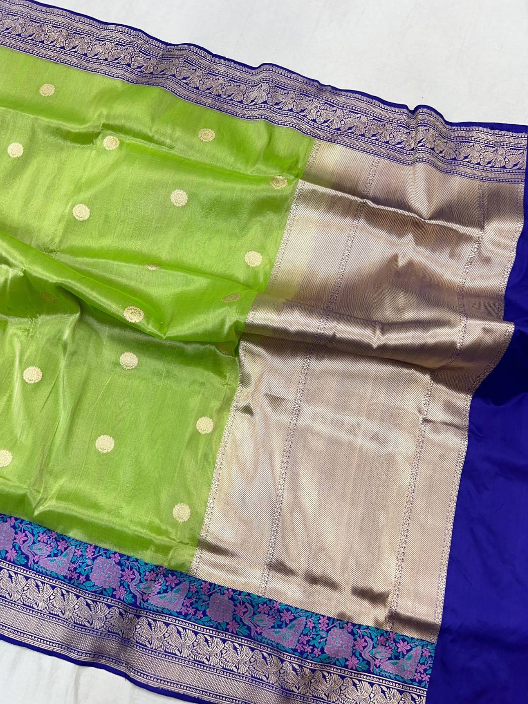 Lime Green tissue silk saree with Elegant zari woven circular butti full view