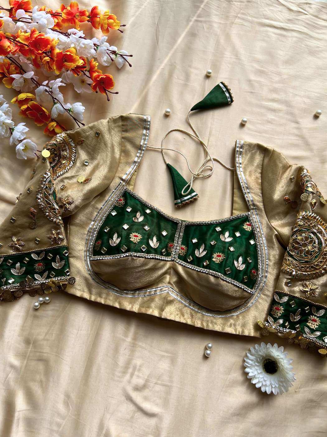 Green Banarasi silk blouse designed for traditional sarees